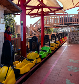 Glide down the signature slide at Qixing Mountain