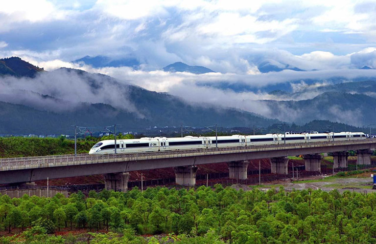 The train is passing through mountains